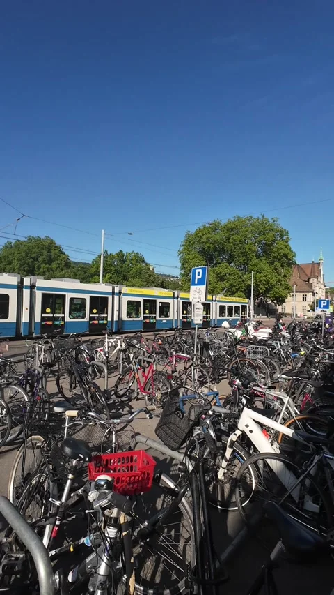 Zurich trams operating on city streets during a regular summer day Stock Footage 339353788