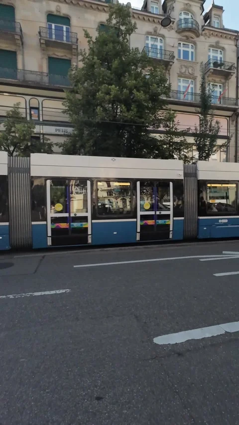 Zurich trams operating on city streets during a regular summer day Stock Footage 339353812