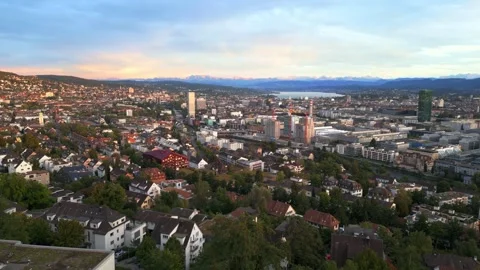 Zurich at twilight, Alpine mountain in the backdrop. Video stock 250567857