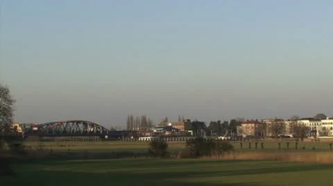 Zutphen skyline in evening sun pan IJssel bridge - city skyline Stock Footage 22317331